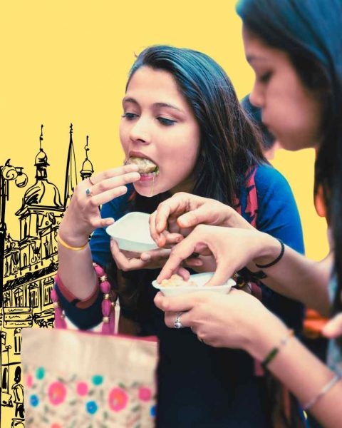 People eating pani puri in a snack evening